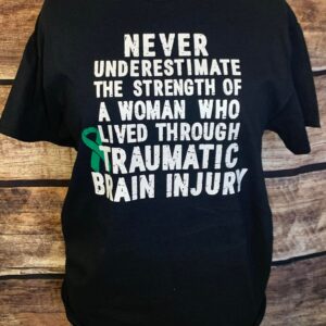 Never Underestimate the Strength of a Woman Who Lived Through Traumatic Brain Injury Shirt