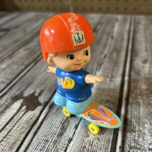 1979 Tomy Wind Up Kid-a-Longs Toy Boy on Skateboard